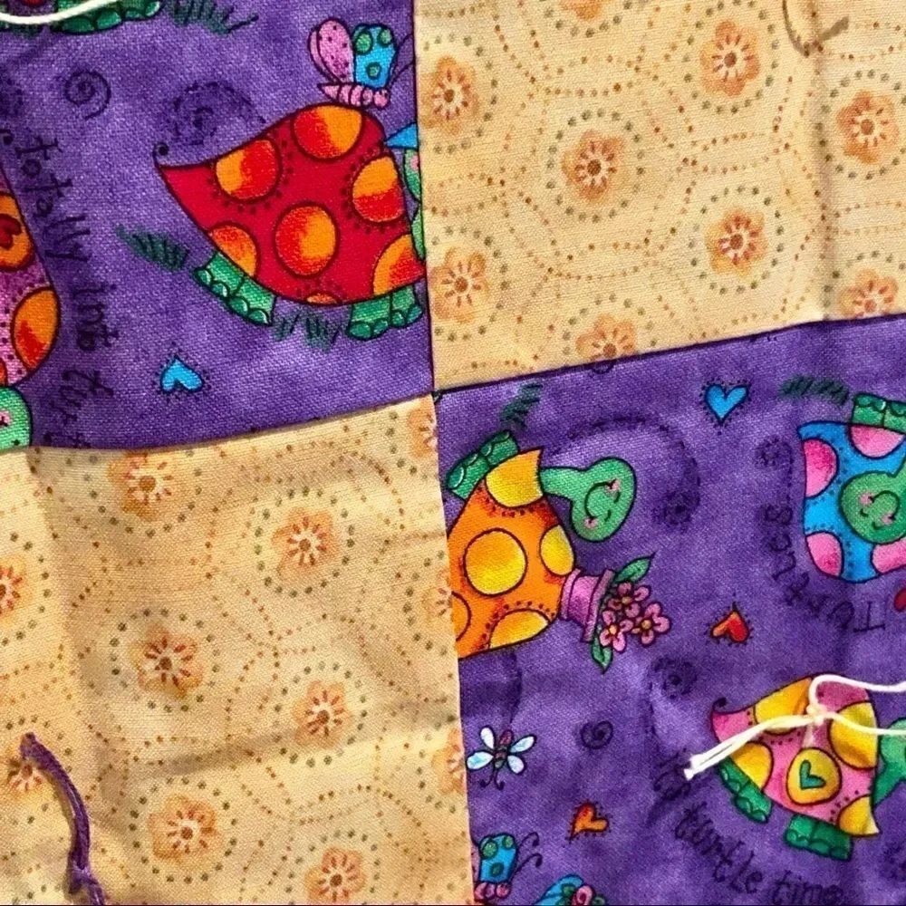 Handmade NWT turtle themed purple and gold baby or lap quilt size 43” X 38”